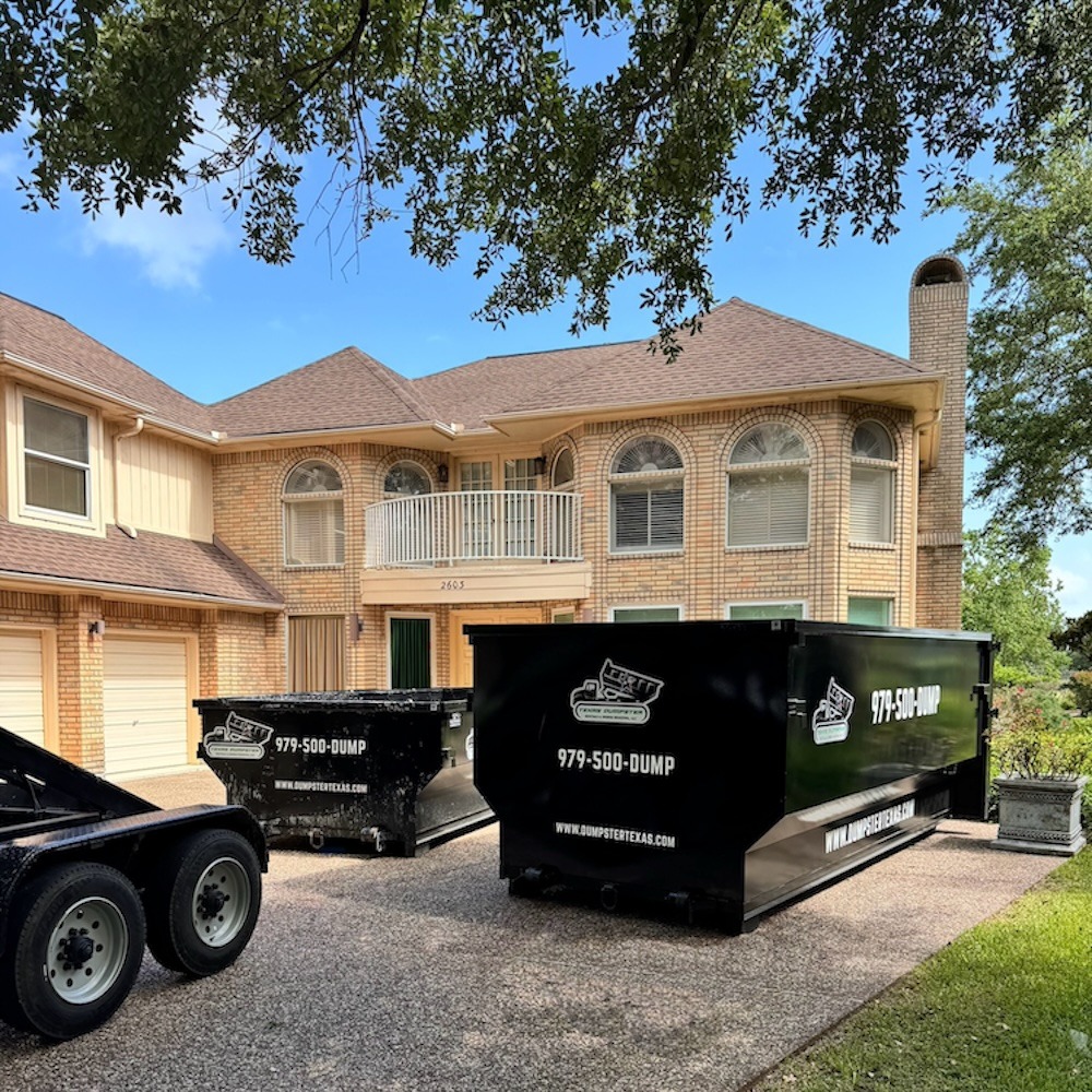 Texas Dumpster roll off dumpsters on a residential driveway